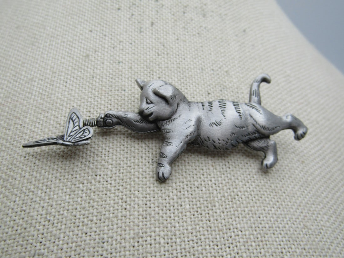 Vintage Cat & Butterfly Trembler Brooch, Signed JJ, 2-7/8": Vintage Cat & Butterfly Trembler Brooch, Signed JJ, 2-7/8" and 1" Tall. The kitten is stretching out reaching out for a butterfly on a spring - trembler brooch. 1980's-1990's. Signed JJ. Very good con
