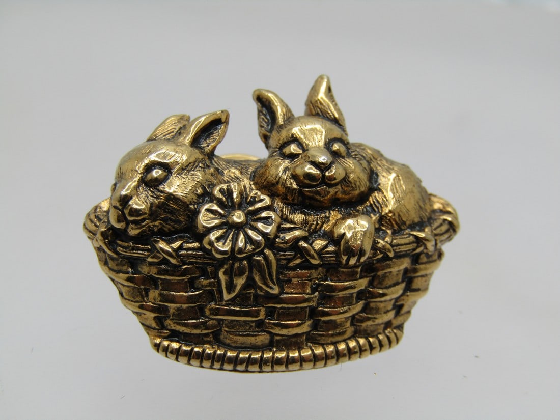 Vintage Bunnies in a Basket Tack Pin, 1980's: Vintage Bunnies in a Basket Tack Pin, 1980's. Two rabbits/bunnies and a flower peeking out of a basket. Textured finish on the rabbits, gold tone, with a nicely detailed woven basket. It is appx. 1-1/