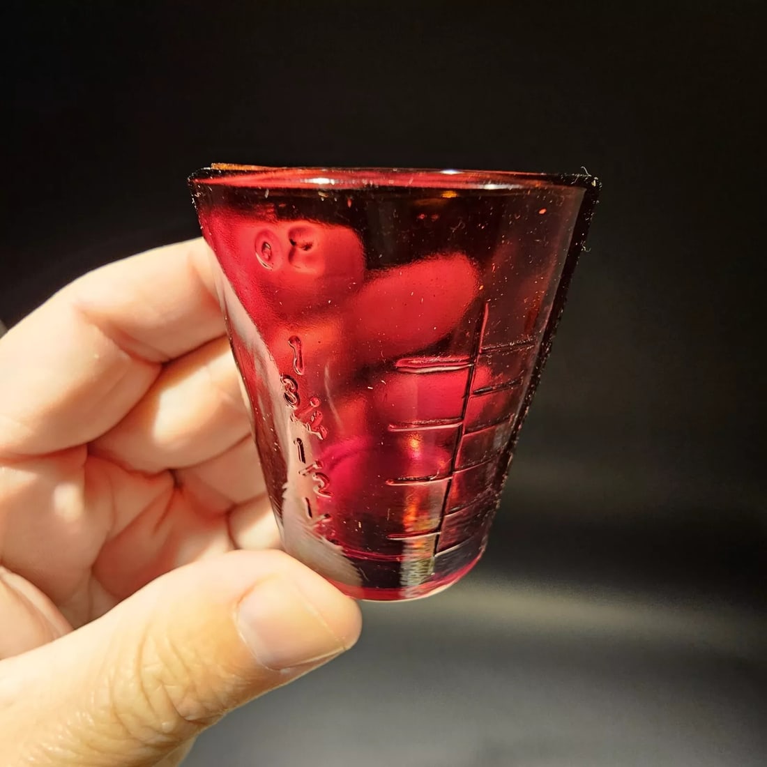 Red Depression Glass 1oz Measuring Shot: 2 1/8 Tall Wonderful reproduction red glass 1oz measuring cup or shot glass. Reserve: $3.00 Shipping: Domestic: Flat-rate of $5.00 to anywhere within the contiguous U.S. International: Foreign shippin