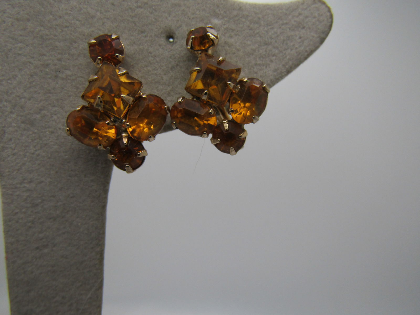 Vintage Gold Rhinestone Earrings, Screwback, 1940's-1950's,: Vintage Gold Rhinestone Earrings, Screwback, 1940's-1950's, appx. 3/4" tall and slightly over 1/2" wide. Signed Coro on the screw back. Comes in a plastic jewelry box with satin lining. Very good cond