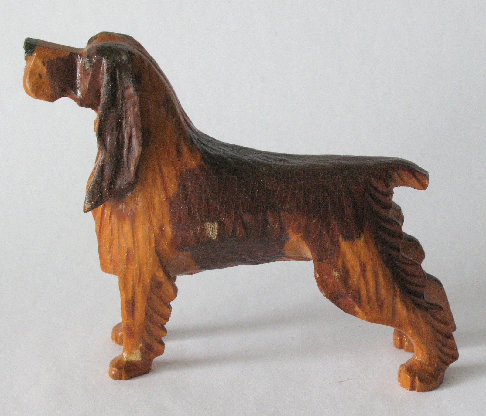 Antique folk art wood carving of a dog.: Title: Antique folk art wood carving of a dog. Date/Period: 1930's Dimension: 6” long Additional Information: Nice antique folk art wood carving of a dog. Shipping: Domestic: Flat-rate of $15.00