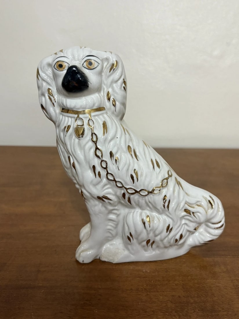 Staffordshire Spaniel Dog: It measures 7” x 5 1/2” x 2 1/2” and is marked. It has a chip on the bottom rim. Otherwise it has no other issues Shipping: Domestic: Flat-rate of $15.00 to anywhere within the conti