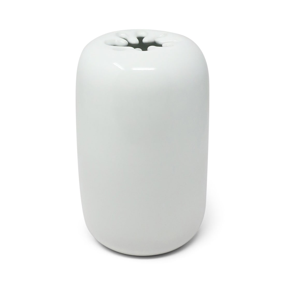 White Spark Vase by David Gil for Bennington Potters: A white "Spark" vase (model 1998) designed in the 1960s by David Gil for Bennington Potters of Bennington, VT. Produced in several sizes and glazes, this is the second largest size vase. The Spark vas