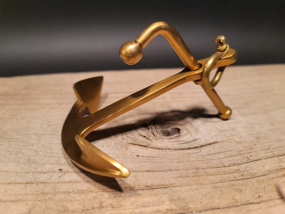 5" Brass Nautical Ships Boat Anchor Paperweight: Description 5" long x 4" Wide Very accurate and well made reproduction of an antique paperweight. All solid brass, darkened to look old. Certainly easy to wonder its age Great for use or display in an