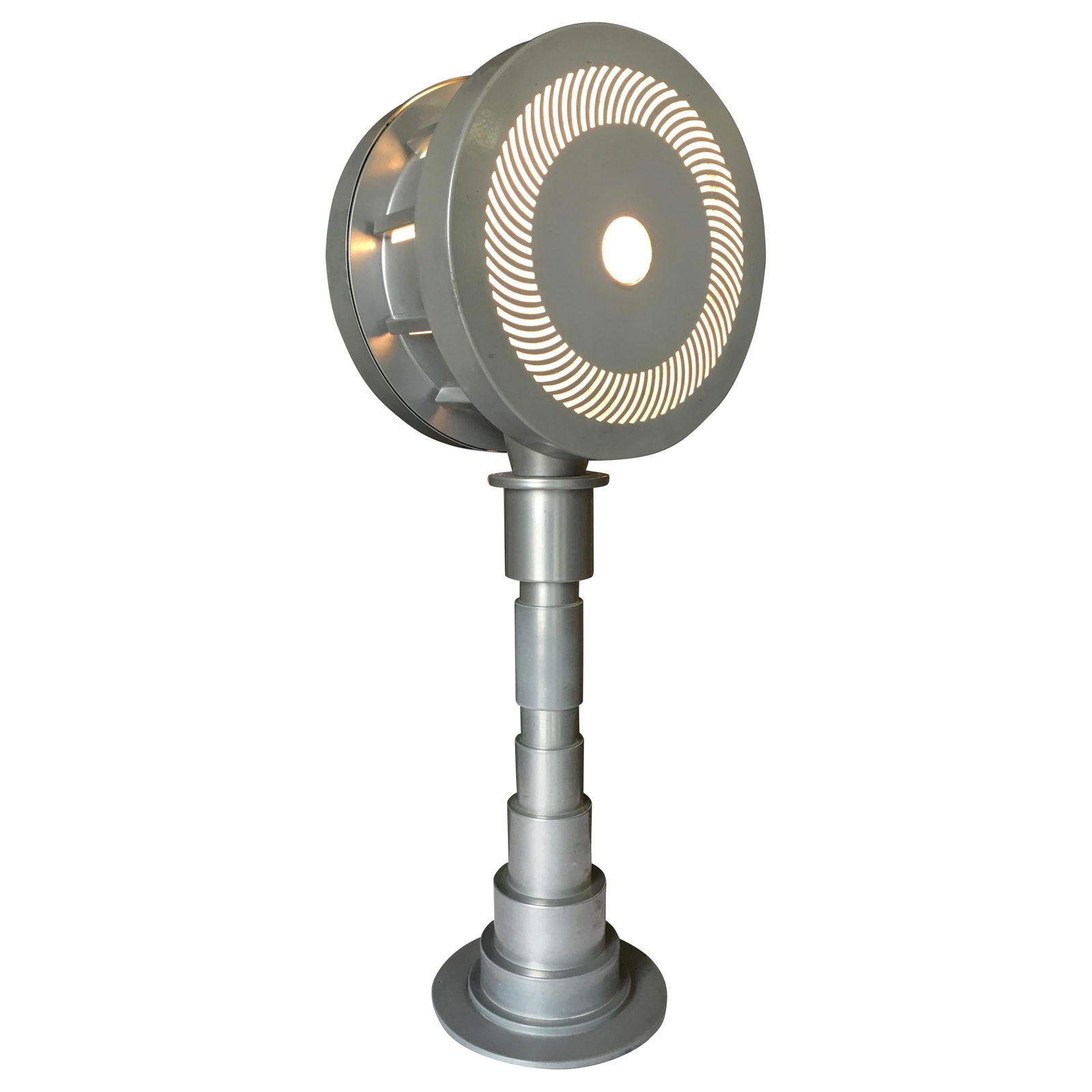 Postmodern Futurist Enameled Steel Table, circa 1990: Postmodern futurist computer age enameled metal table featuring a metal drum shade with over 180 cut-outs fixed to a large machine part base, circa 1990 available- 2. Dimensions: Height: 24 in (60.96