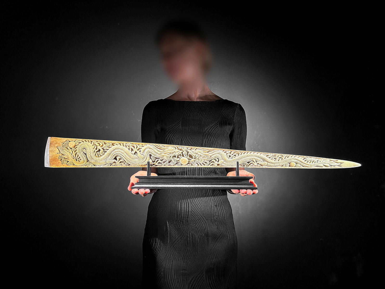 A large carved swordfish - Double Dragon motif: Title: A large carved swordfish - Double Dragon motif Maker:Unknown Origin: Indonesia Date/Period:2024 Materials:Xiphius Gladius, Bone, Wood Dimensions:Length: 87 cm / 34.2 inches Description:A large