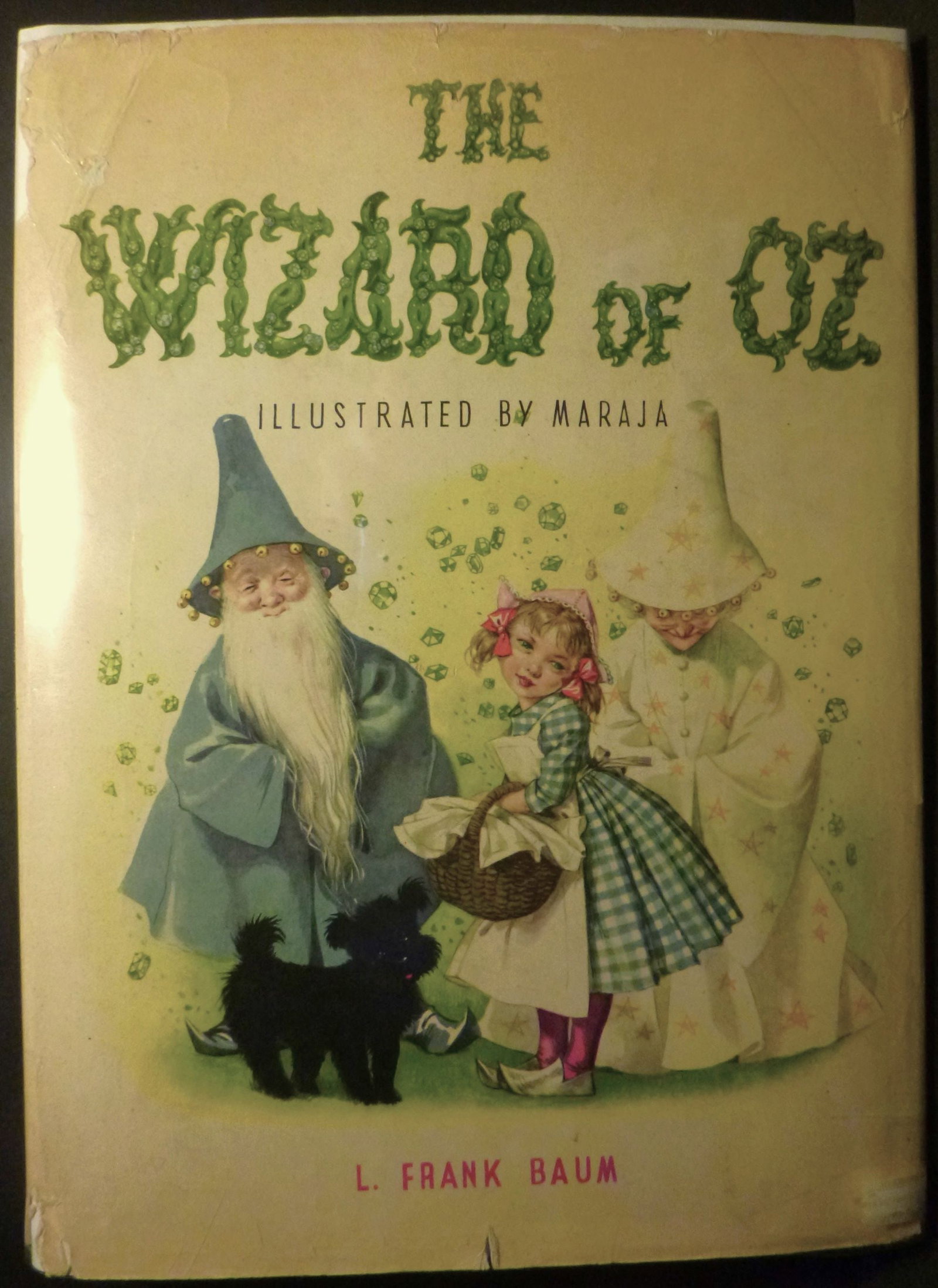 The Wizard of Oz: Title: The Wizard of Oz Author: L. Frank Baum Date: 1958 Publisher: Grosset & Dunlap NY Edition: --- Additional Information: Folio 13",121pp. Color pictorial boards. Color illustrations throughout. Ed