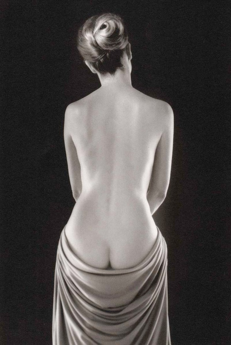 RUTH BERNHARD - Draped Torso,1962: Artist: RUTH BERNHARD Print Title: Draped Torso,1962 Medium: Duotone Photoengraving Printed in USA in 1980’s Image Size approx: 9 x 6” Ruth Bernhard (1905 – 2006), was a legendary Sa