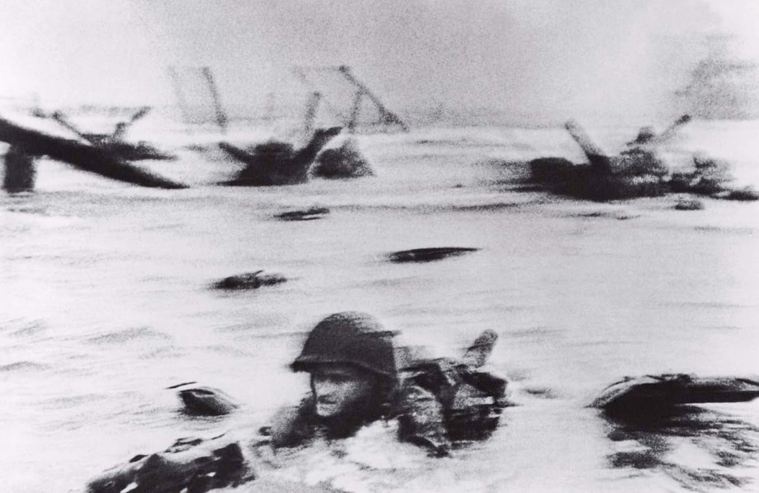 ROBERT CAPA - Omaha Beach, Normandy, June 6, 1944: Artist: ROBERT CAPA Print Title: Omaha Beach, Normandy, June 6, 1944 Printing Date: 2007 Medium: photo-lithograph Printed in: Italy Image Size approx: 7 x 10.5”