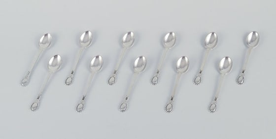 Evald Nielsen No 13, a set of eleven coffee spoons in 830 silver. Hammered finish.