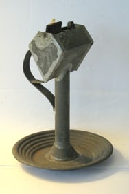 Antique tin 19th. Century fluid lighting device.
