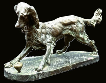 Bronze Dog Playing with Spinning Top