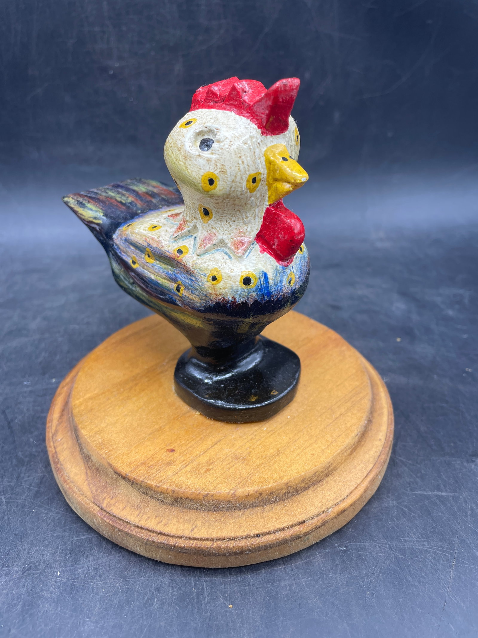 Folk Art Rooster Hand Carved and Signed: Title: Folk Art Rooster Hand Carved and Signed Date/Period: 2015 Dimension: Approx. 5" tall on a 5" diameter base Material: wood Additional Information: Folk Art Rooster Hand Carved and Signed Ray DeB