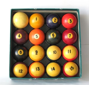 Vintage set of regulation billiard balls.