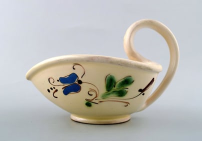 Kähler, Denmark, glazed stoneware jug with handle.