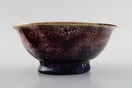 Scandinavian ceramist, art pottery bowl with purple glaze.
