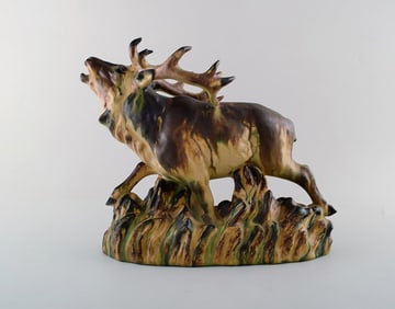 Large Arne Ingdam ceramic figure. Roaring deer.