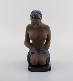 Bengt Wall, Sweden. Balinese girl in raw and glazed ceramics with gold decoration. 1950's.