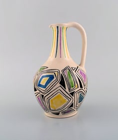 European studio ceramist. Unique jug with handle in glazed ceramic. Dated 1957.