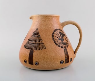 European studio ceramist. Unique jug in glazed ceramic. Dated 1947.