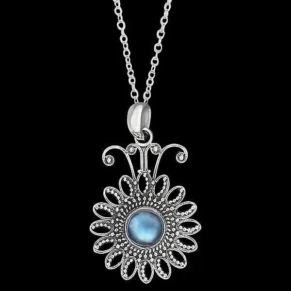 Flower Shaped Sterling Silver Pendant with Rainbow Moonstone: Title:Flower Shaped Sterling Silver Pendant with Rainbow Moonstone Description:Specifications LCO73 Sterling Silver Dimensions: 1.2 INCH HEIGHT x 1 INCH WIDTH Weight: 5.50 gm Reserve: $40.50