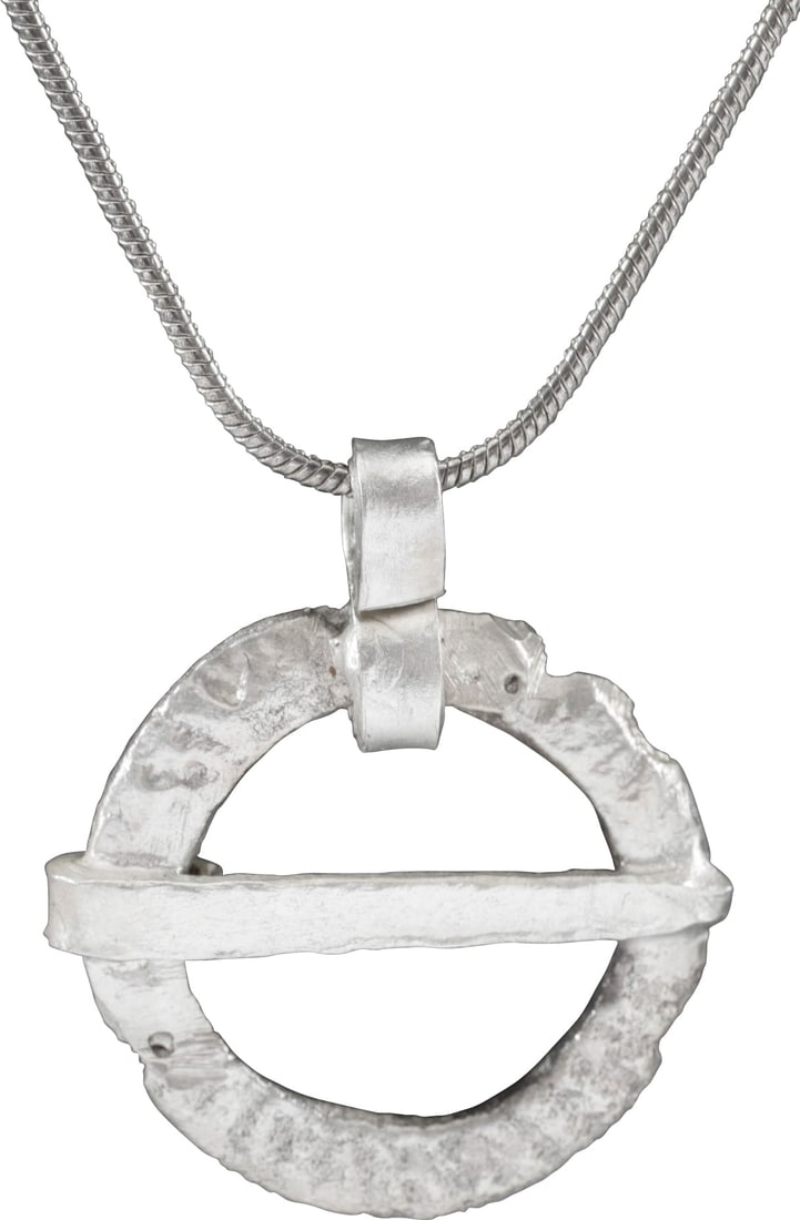 ANCIENT VIKING PROTECTIVE BROOCH NECKLACE.: Worn in numbers on the surface of the jerkin, these small metal brooches provided a measure of protection against sword cuts and, in fact, were a form of armor. See current Public Television programmi