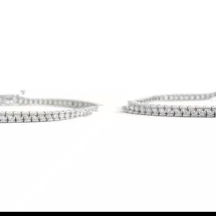 Channel-Set Diamond Tennis Bracelet 14K White Gold, 2.25 CTW, 12.71 Grams: Channel-Set Diamond Tennis Bracelet 14K White Gold, 2.25 CTW, 12.71 Grams Make a statement with this gorgeous diamond bracelet. Please let us know if you have any questions. Diamonds: 75 round brillia