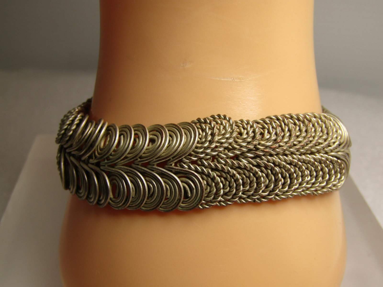 Vintage Boho Coiled Bracelet, Double Row, 8", Unisex, 1970's-1980's: Vintage Boho Coiled Bracelet, Double Row, 8", Unisex. Estimated from 1970's into the 1980's. This is appx. 3/4" wide with two joined rows of coiled silver tone wire - in alternating sections of flat c