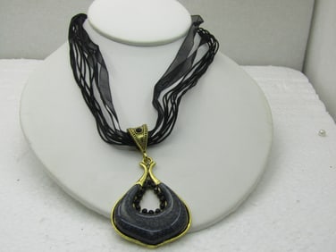 Black Pendant on 16" Black Multi-Strand Ribbon Necklace with Rhinestones.
