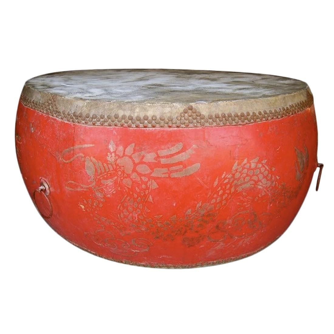 1930s Gigantic Asian Drum: A monumentally scaled Asian drum. I just thought it was so sculptural that I had to have it! It is covered on both sides in hide. This would make a sensational center table. DIMENSIONS: 75.5"W " 75.5"