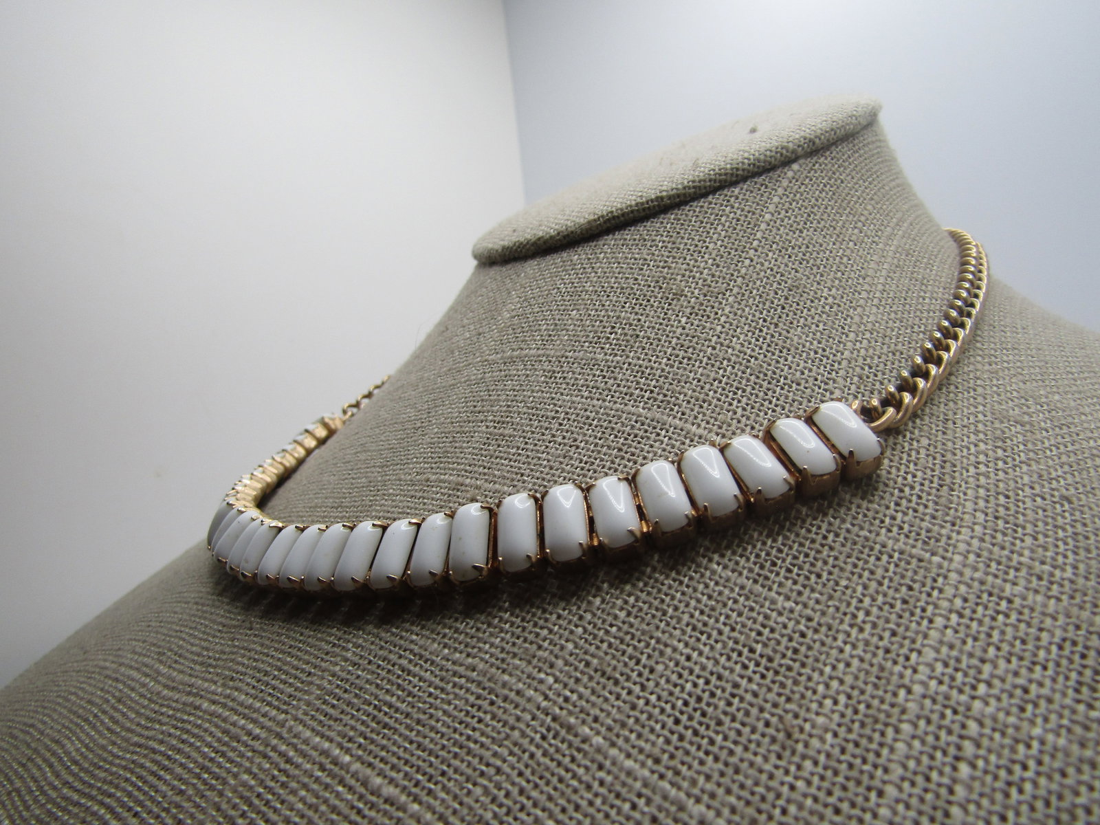 Vintage White Milk Glass Necklace, 15.5", 1940's-1950's: Vintage White Milk Glass Necklace/Choker, 15.5", 1940's-1950's. It is appx. 8.5mm wide where the prong-set rectangular white stones are and crosses the front 6" of the neck with the remaining being a 