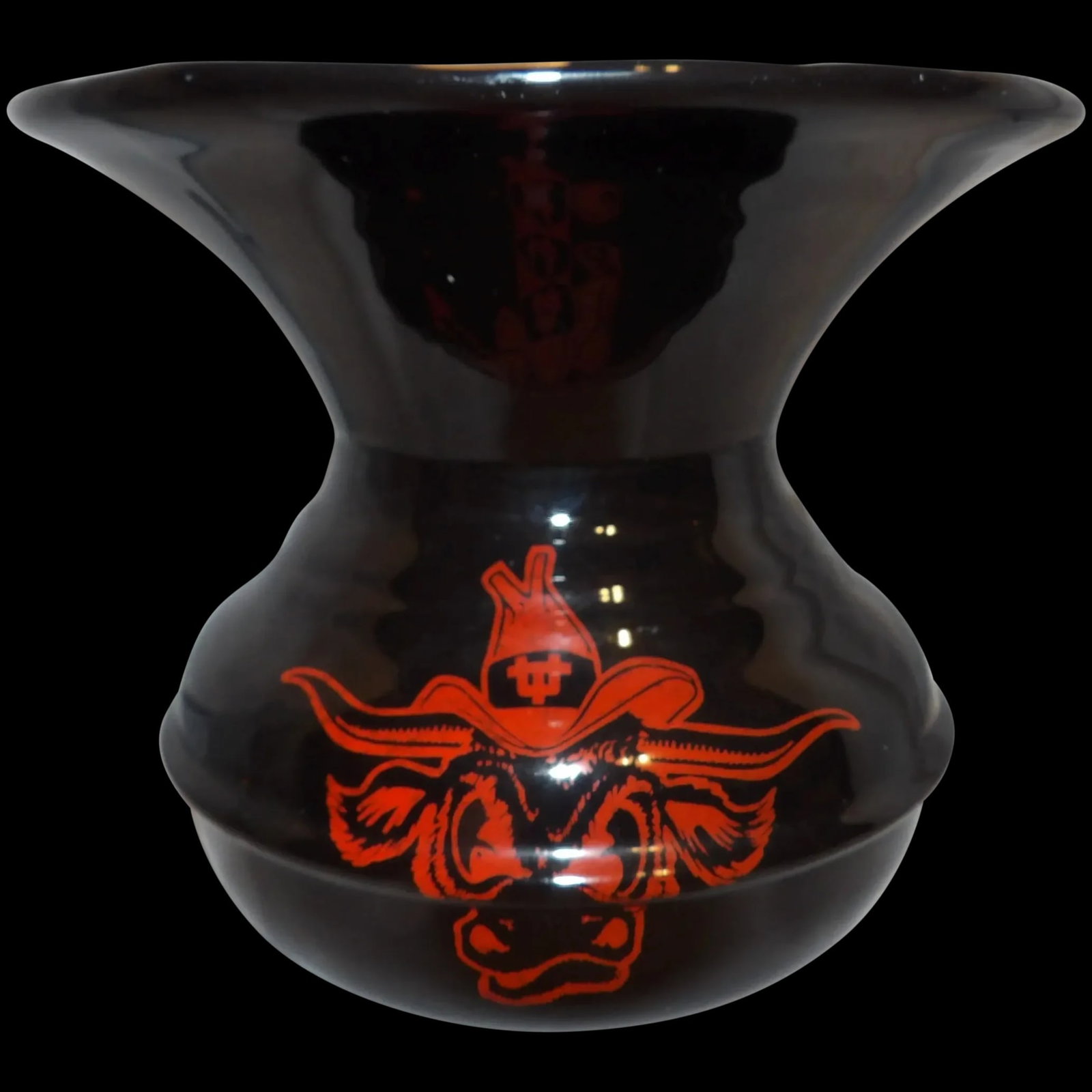 University of Texas Spittoon RARE: This University of Texas Spittoon is a rare find not sure you would find another. It is adorned with a Texas longhorn and he seal of the University of Texas. It is in excellent condition -the only chi
