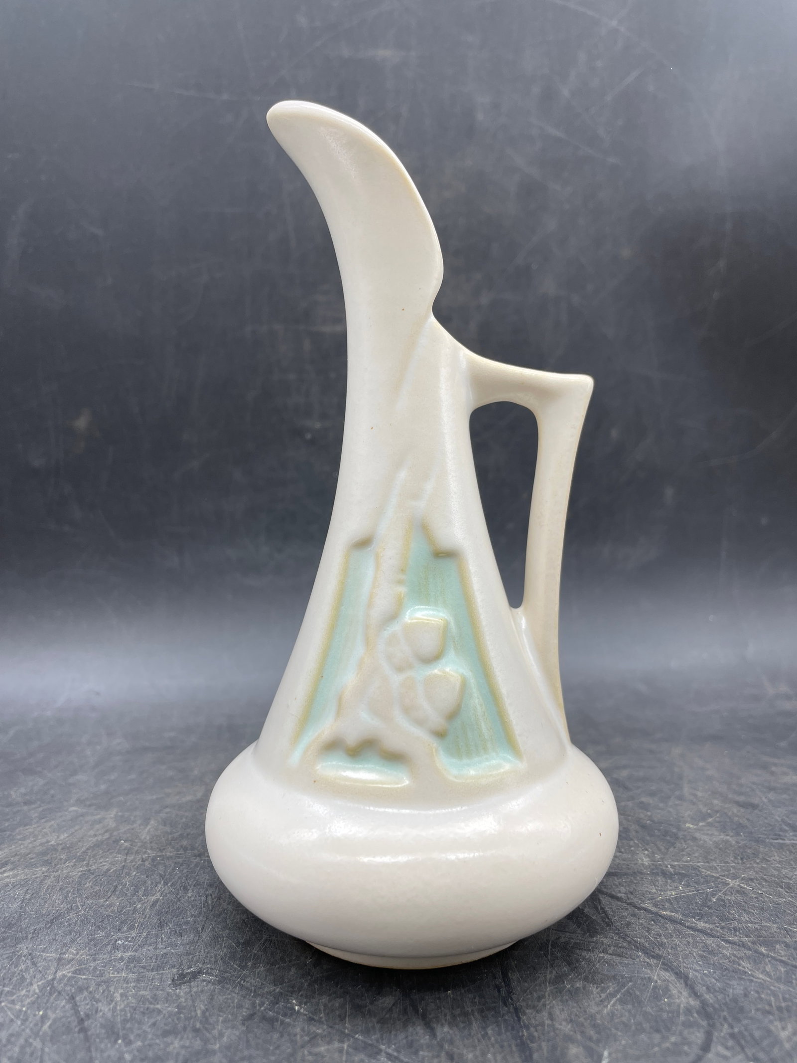 Vintage Roseville Pottery White w/ Green Silhouette Ewer: Title: Vintage Roseville Pottery White w/ Green Silhouette Ewer Date/Period: unknown Dimension: Approx. 6.25" x 3.25" Material: pottery Additional Information: Vintage Roseville Pottery White with Gre