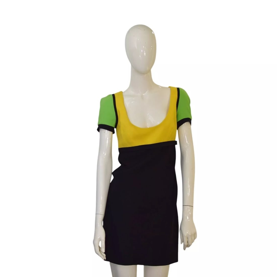 Gianni Versace Black Green Yellow Wool Short Sleeve Mini Dress size 42: Gianni Versace Black Green Yellow Wool Short Sleeve Mini Dress size 42 This magnificent dress is crafted from wool fabric, fully lined, in black, yellow and green colors, side zipper, criss-cross deta