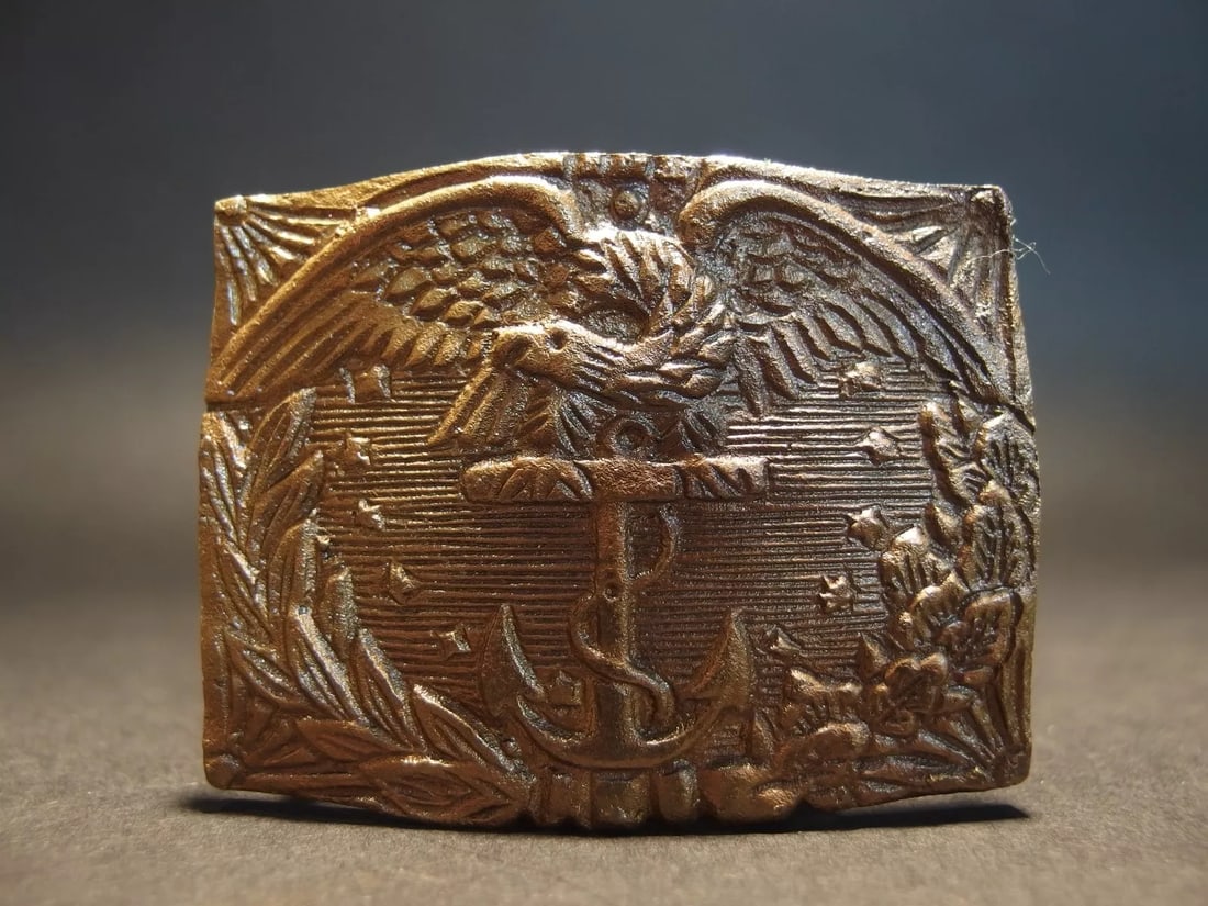 Civil War Union Revenue Cutter Service Belt Plate Eagle w Anchor: 2 3/4" Wide x 2 1/8" high Wonderful reproduction Civil War Union Revenue Cutter Service belt plate. All brass belt buckle with the modern belt loop, works with a 1 1/2" wide belt. Reserve: $18.00 Ship
