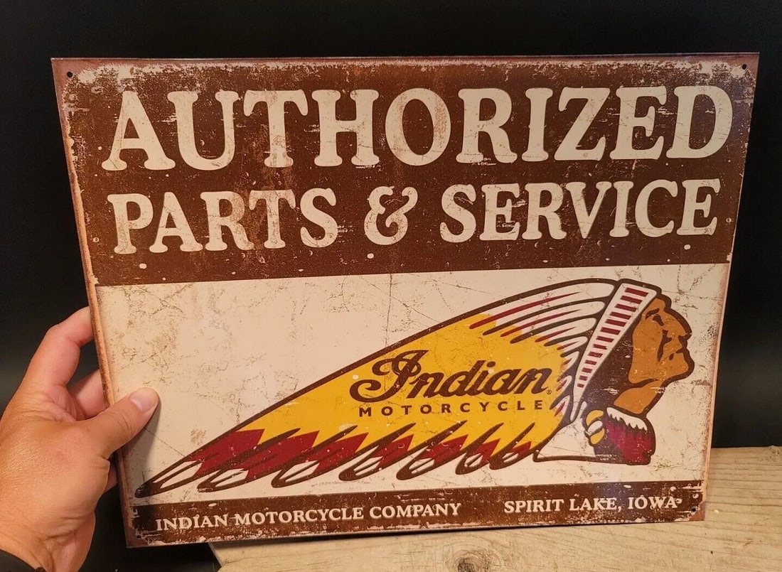 Indian Motorcycle Sign: 16" x 12 1/2" Such a neat reproduction metal Vintage Style Indian motorcycle sign. Great decorative piece. Reserve: $20.00 Shipping: Domestic: Flat-rate of $10.00 to anywhere within the contiguous U.S
