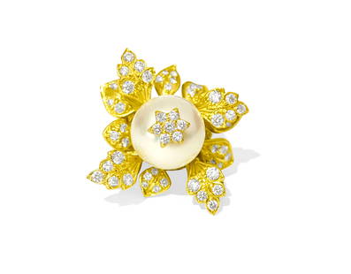 20ct Natural Pearl & Diamond Leaf Motif 18k Gold Ring: Metal: 18k yellow gold. Center stone: 20cts Natural South Sea Pearl, round shape. Excellent color and saturation. Diamonds: TCW of 4.50cts. Color: F-G. Clarity: VS. Round brilliant cut diamonds. 100%