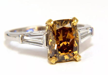 GIA Certified 2.59ct Fancy Yellow Brown Diamond Ring Platinum: GIA 2.59ct. Cushion cut diamond & .50ct. diamonds ring. Report: 5182115065 Dark Yellowish Brown 8.95 x 6.63 x 5.38mm (GIA Report attached) .50ct baguette diamonds. H color, Vs-2 clarity. Platinum 4.4
