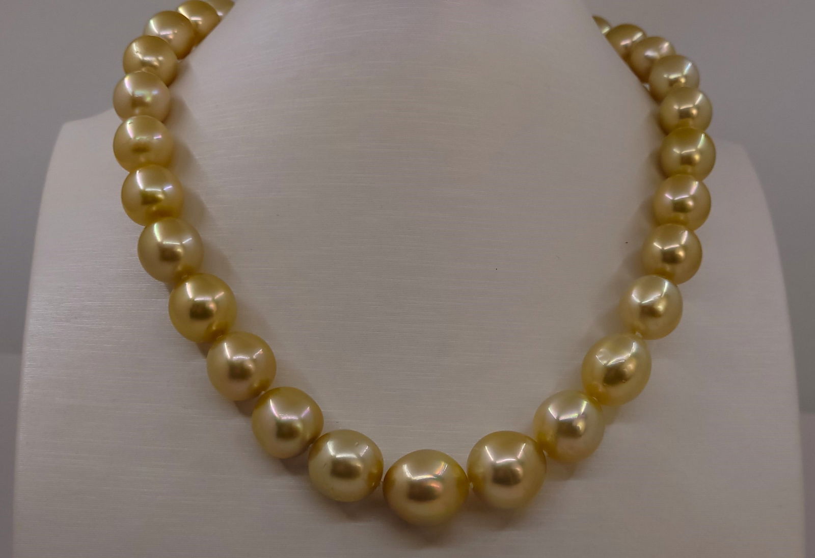 Necklace PSL Certified Australian Deep Golden South Sea Pearls -10.0x13.5mm: Title: Necklace PSL Certified Australian Deep Golden South Sea Pearls -10.0x13.5mm Description: This necklace is in the category of the strongest Teri according to the tested results and the P.S.L cri
