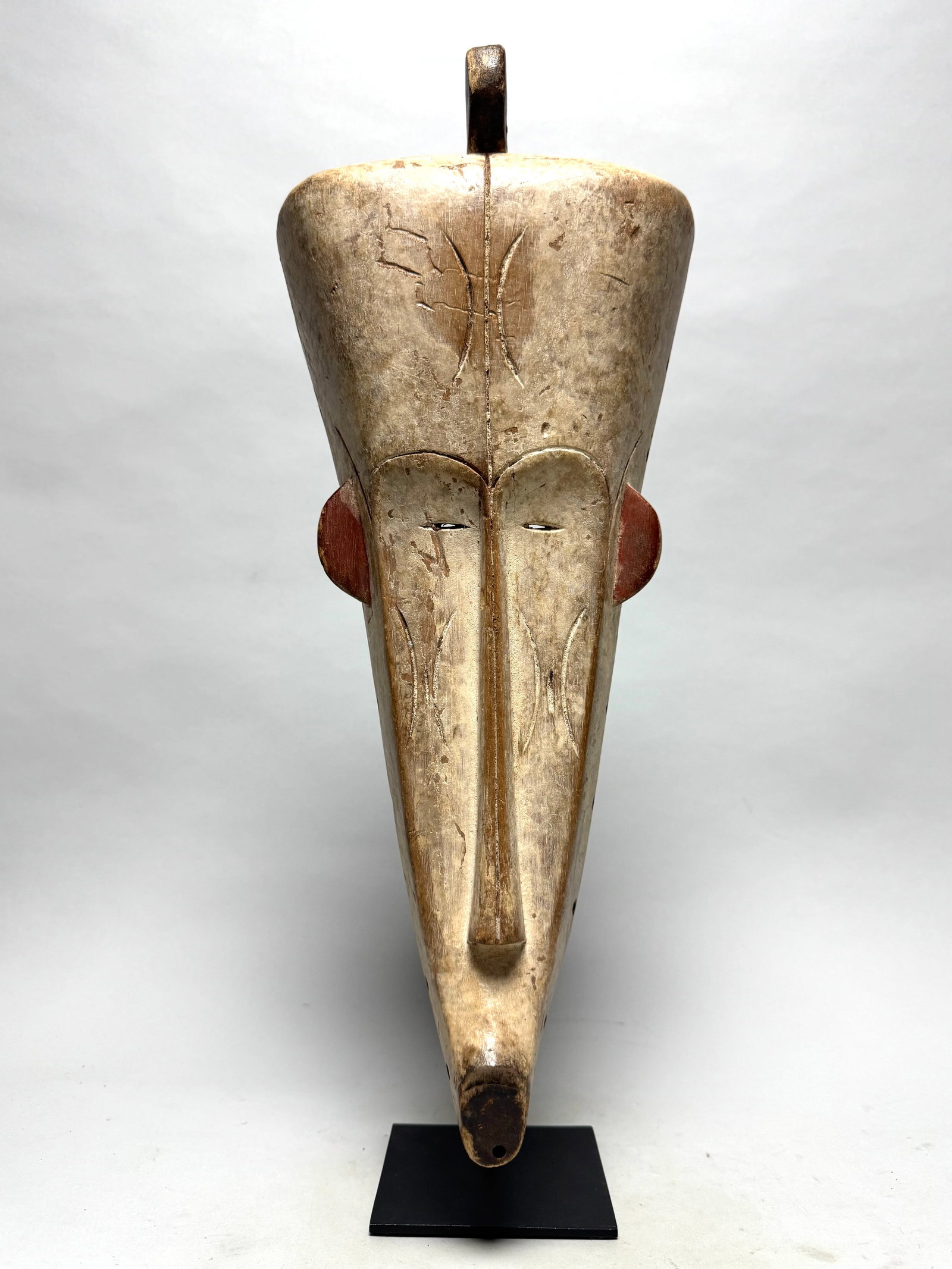 Fang - Ngil mask - Gabon, Africa: These masks were used by the male NGIL society that no longer exists today. This secret society was responsible for the initiation and they fought against witchcraft. The Ngil had a ritual purifying f