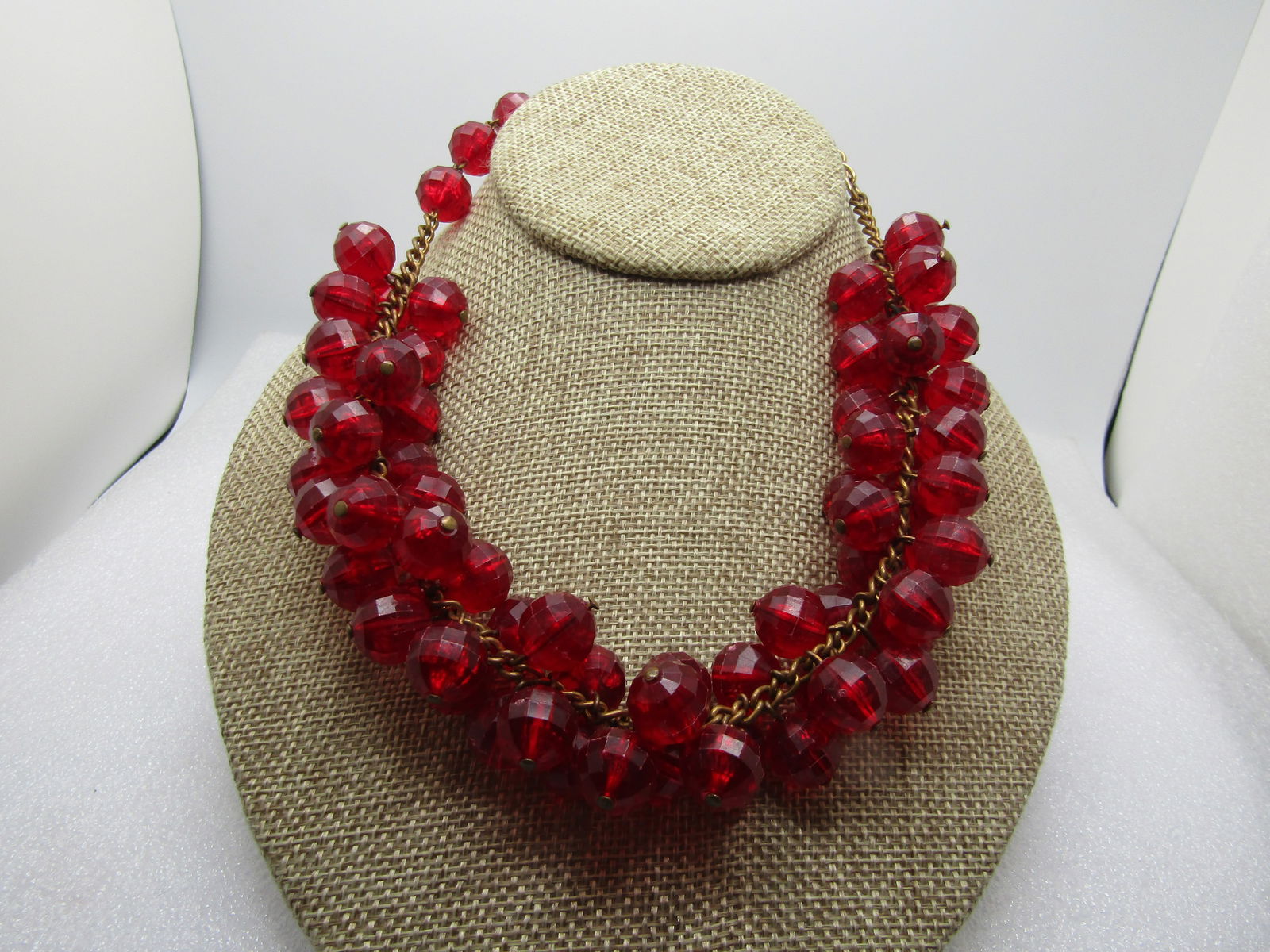 Vintage Red Faceted Lucite Beaded Necklace, 17", Dangle Beads, 1960's-1970's: Vintage Red Faceted Lucite Beaded Necklace, 17", Dangle Beads, 1960's-1970's. Gold tone chain with 12mm faceted red beads that are made of lucite/plsatic. They are strung on a gold tone chain that is