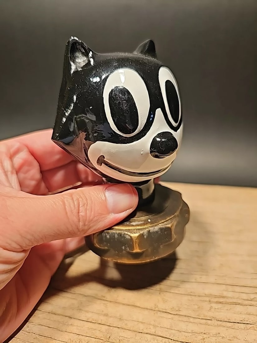 Iron Felix Figure Radiator Cap Statue (1 of 17)