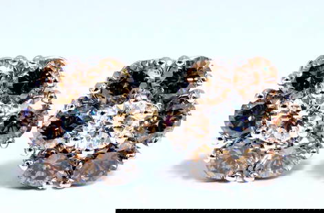 2.44ct. natural round diamond cluster earrings 14 karat Fancy Browns: Cluster diamond earrings. Natural round diamonds .36ct center (2) diamonds. G-color Vs-2 clarity 2.44ct side diamond accents. Natural Fancy Browns - Si-1 clarity 14 karat white gold 3.5 grams Earrings
