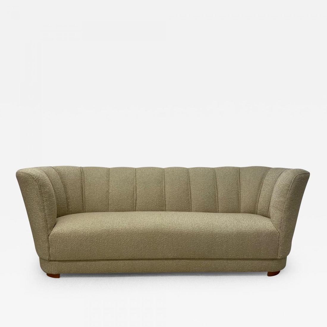 Flemming Lassen Style, Danish Mid-Century Modern, Curved Sofa, Boucle, 1940s: Flemming Lassen Style, Danish Cabinetmaker, Mid-Century Modern, Curved Sofa, Beige Boucle, 1940s Beautifly organic shaped Danish sofa similar to works by Flemming Lassen. This sofa features a newly up