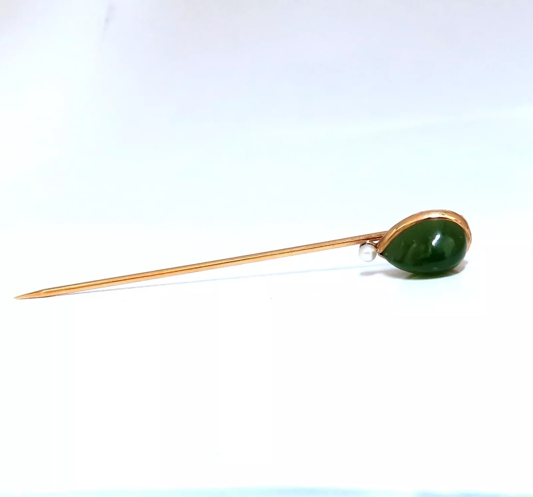 Natural American Green Jade Hat stick Pin scarf 14kt gold: 11x7 mm mm natural 5 carat pear shape natural American Jade. 68 mm long stick 14 karat gold 2 grams ....*. Reserve: $320.00 Shipping: Domestic: Free shipping to anywhere within the contiguous U.S. In