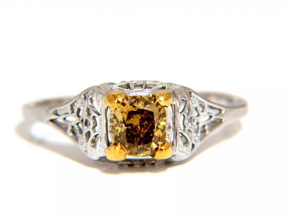 .57ct Natural Fancy Orange Brown Diamond Vintage Gilt Ring 14 Karat: MAGNIFICENT JEWELS Vintage Gilt .57ct. Natural Fancy Orange brown round brilliant diamond ring. Vs-2 clarity and full cut. 14kt. yellow gold Top deck: 7.2 mm wide Depth: 5.9mm 1.7 grams Excellent well