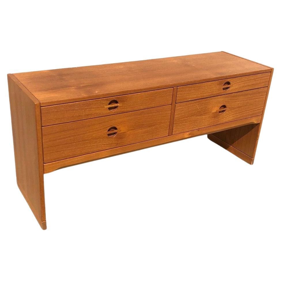 Danish Modern Teak Console Table w/ Four Drawers by Aksel Kjersgaard: Original Mid-century Danish Modern Teak console table/sideboard designed by Ebbe Gehl for Aksel Kjersgaard, circa 1960. The table is Marked with "No. 694 Made in Denmark." It features the iconic pig n