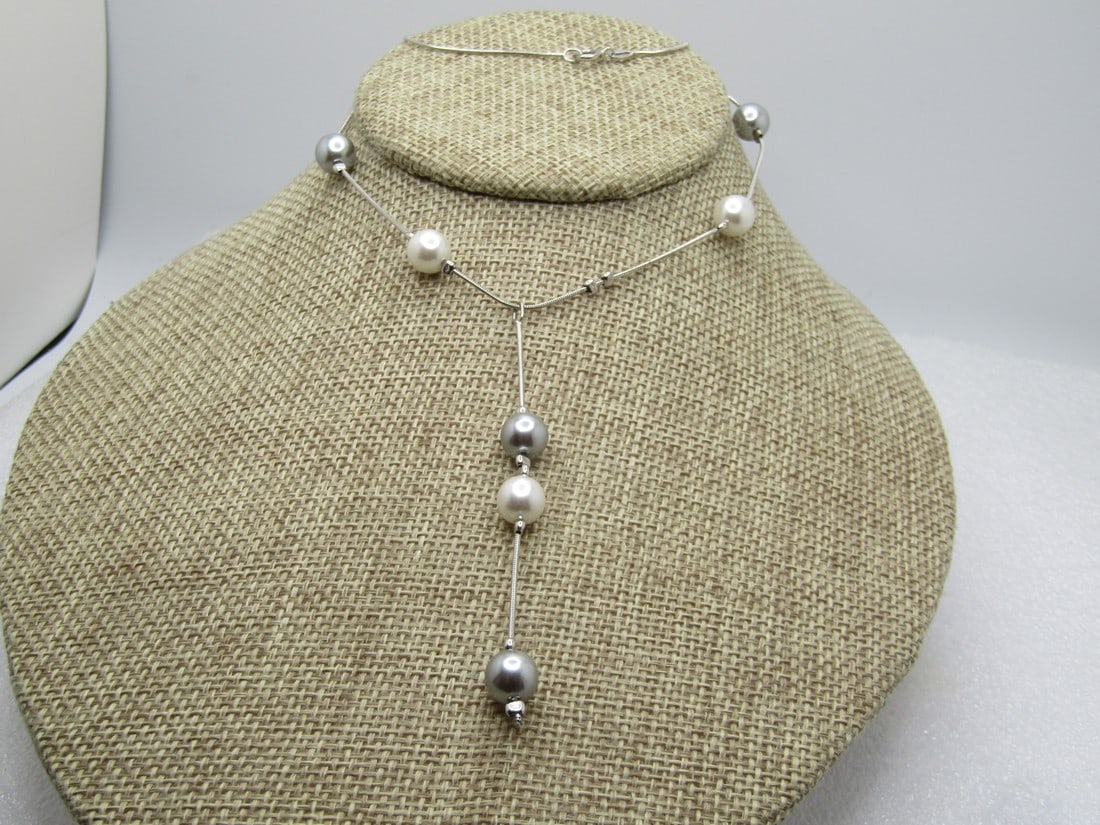 Sterling Silver & White Tahitian Pearl Necklace, 16", 1990's, Signed: Sterling Silver & White Tahitian Pearl Necklace, 16", 1990's, Signed with a Star and AR along with a number 2077. It is marked sterling and tests as sterling with a total weight of appx. 6.48 grams. T