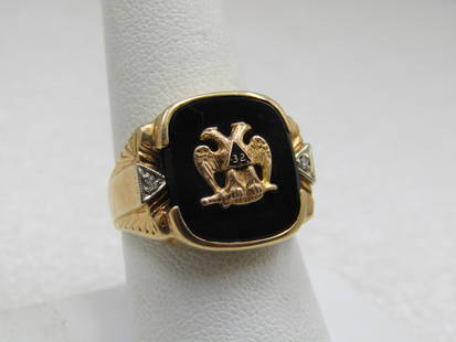 10kt Masonic Eagle 32nd Level Ring, signed Romany, Sz. 9, Onyx: 10kt Masonic Eagle 32nd Level Onyx Ring, signed Romany, Sz. 9. Weight is appx. 7.46 gr. Gold eagle set on black onyx. White gold triangles with small diamond set at each side. The ring is appx. 20mm b