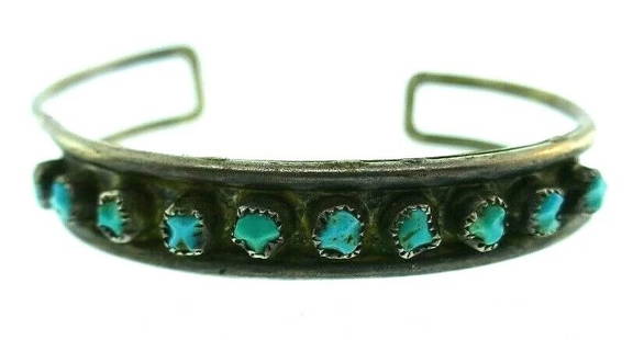 AMERICAN INDIAN Sterling Silver & Turquoise Bangle Bracelet Vintage: DK American Indian Sterling Silver & Turquoise Bangle Bracelet Vintage · This is a must for a collector. The weight is 13.4 grams. The length from within is 7 inches. The height is 3/8 of an inch